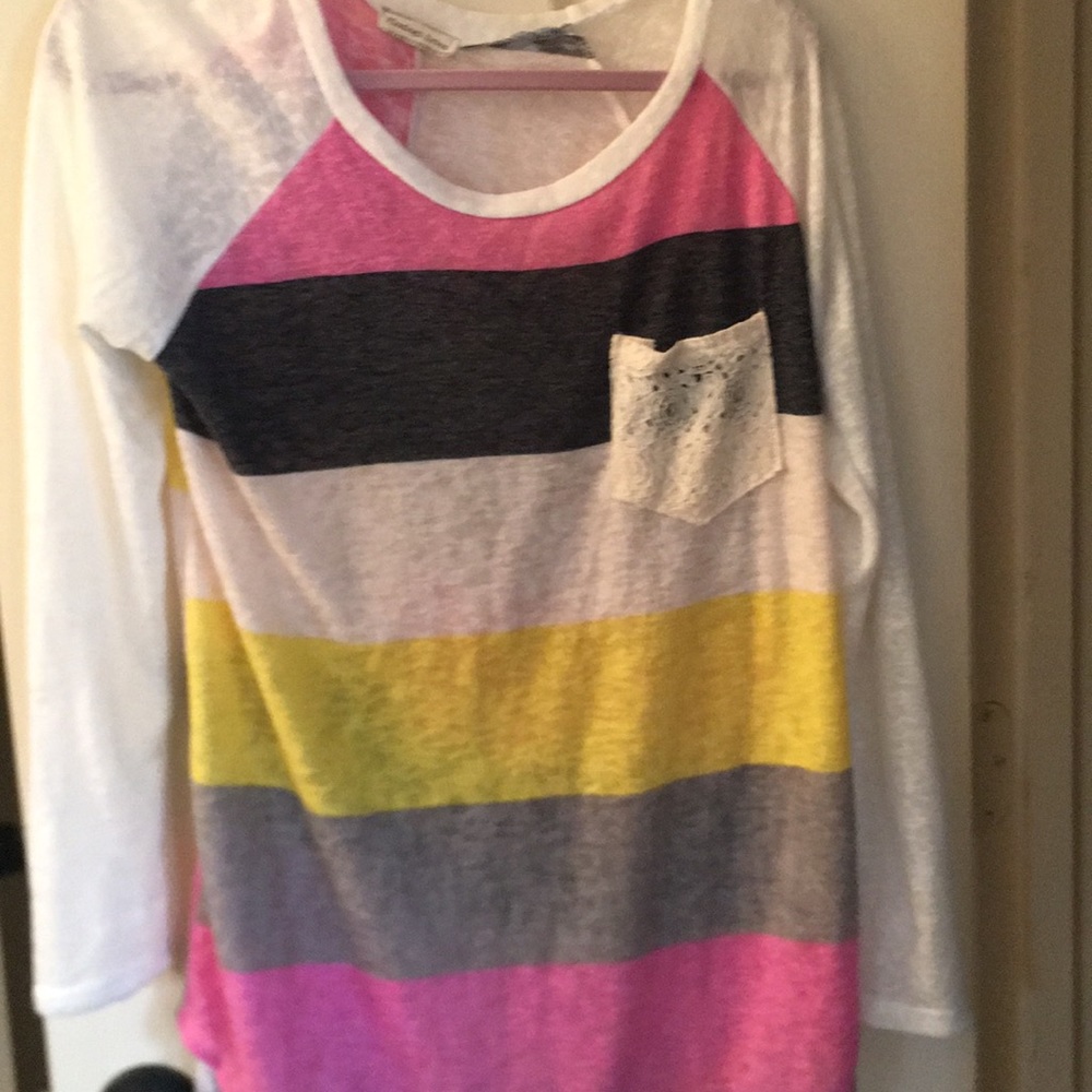 Spring colors in a tunic top with lace pocket